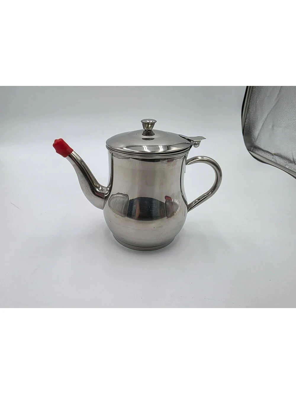 Stainless Steel Teapot with Red Spout Cover and Lid Strainer